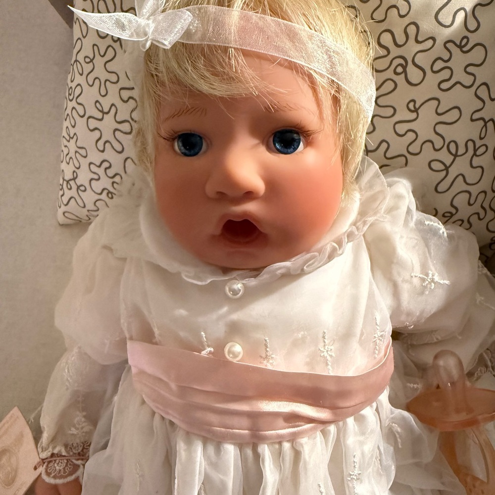 Adorable Blonde Baby Doll with Pink and White Dress
